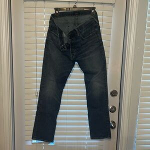 Men’s polo distressed button fly jeans